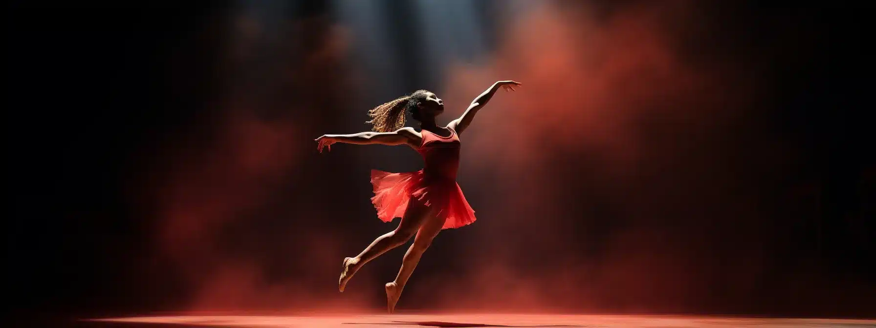 A Dancer Gracefully Performing On A Vibrant Stage, Captivating The Audience With Their Dynamic Routine.