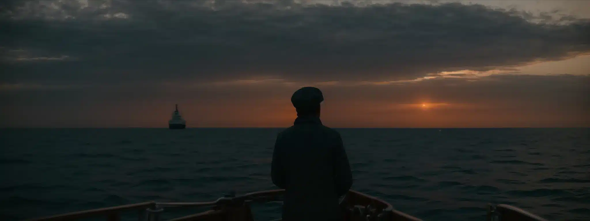 A Person Stands At The Helm Of A Ship, Gazing Out At The Horizon Where The Sun Sets Over A Calm Sea, Symbolizing The Strategic Journey Ahead.