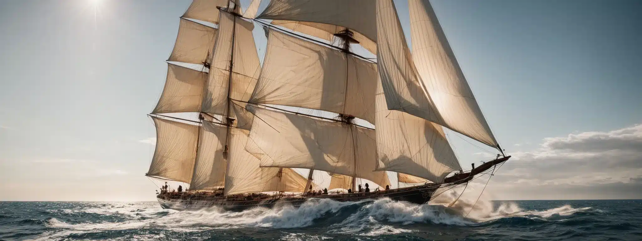A Sturdy Ship With Unfurled Sails Glides Through Open, Sunlit Waters, Embarking On An Adventurous Journey.