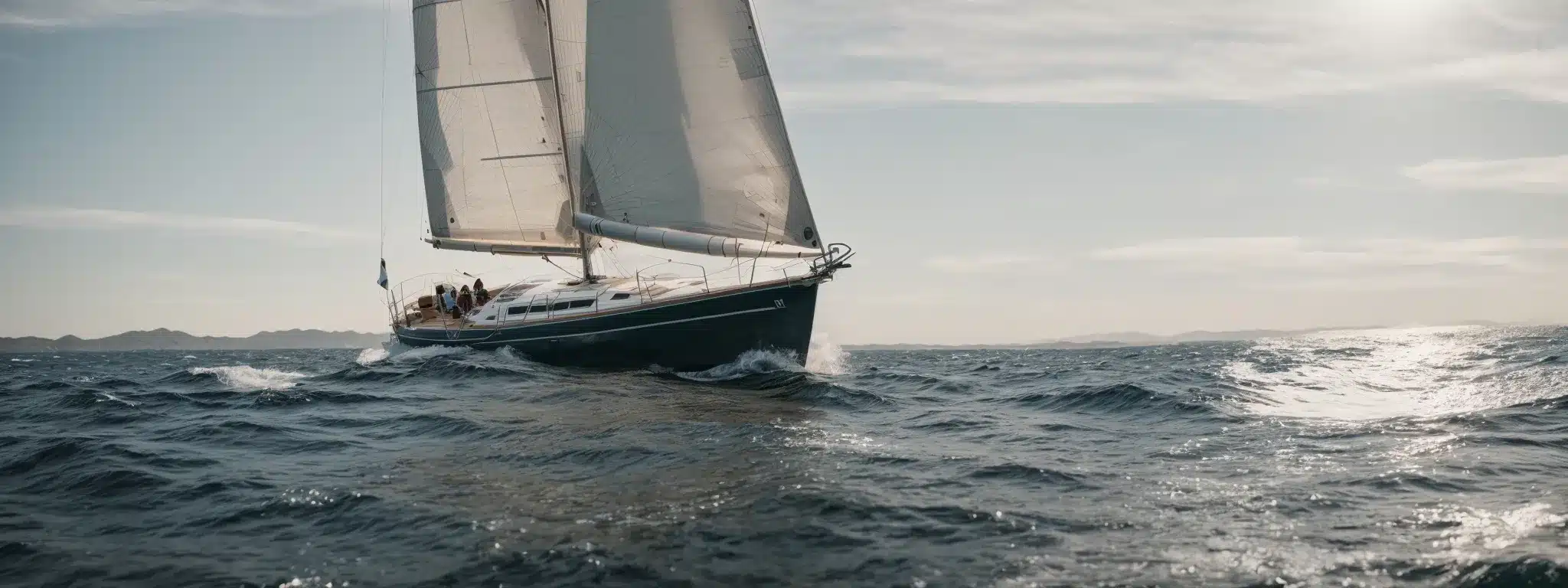 A Sturdy Sailboat Navigating Through Calm Seas Represents A Brand'S Ongoing Journey Of Growth And Adaptation.