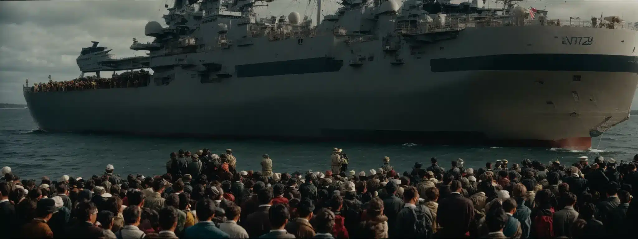 A Ship Embarking On Its Maiden Voyage With A Crowd Gathered To Witness The Launch.