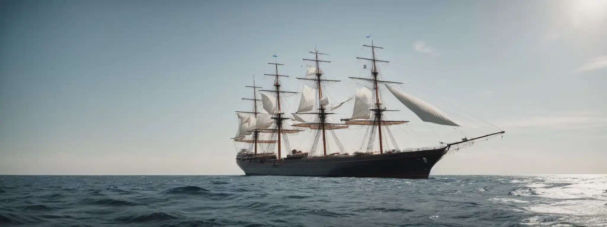 A Stately Ship Sailing Clear Waters Under A Wide, Open Sky As A Metaphor For Navigating Brand Strategy.