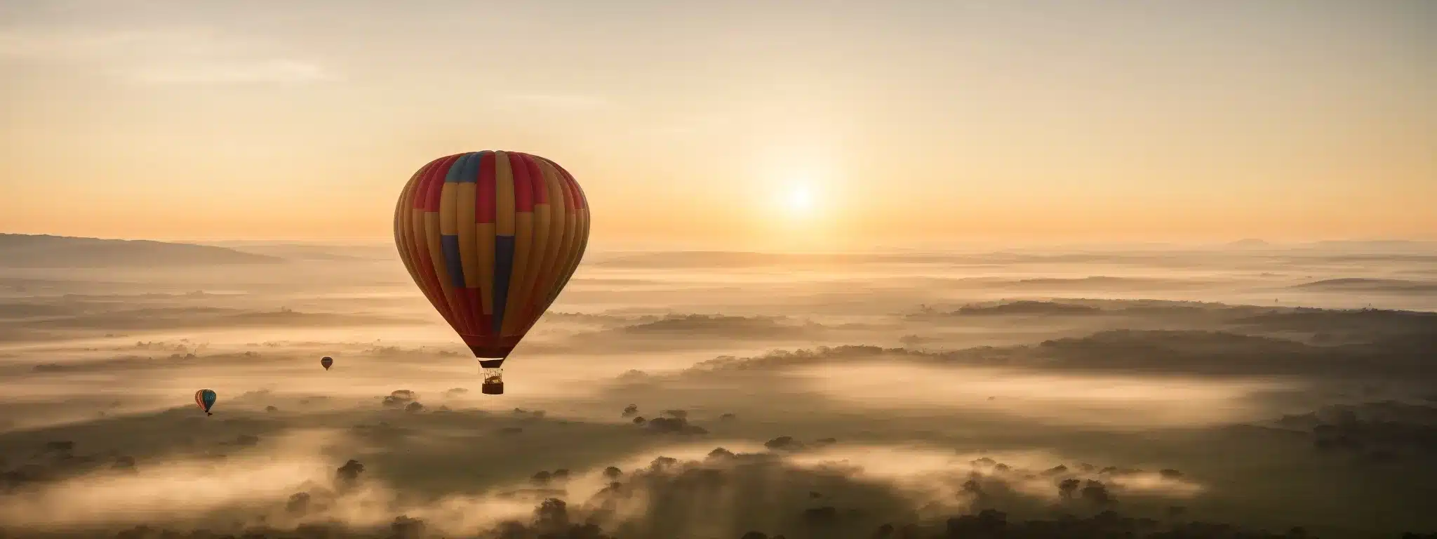 A Soaring Hot Air Balloon With A Blank Canvas Gliding Over A Tranquil Landscape At Sunrise Symbolizes The Rise Of Brand Awareness.